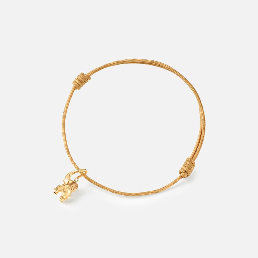 Elephant string bracelet in yellow gold with a diamond on beige nylon string | Ole Lynggaard