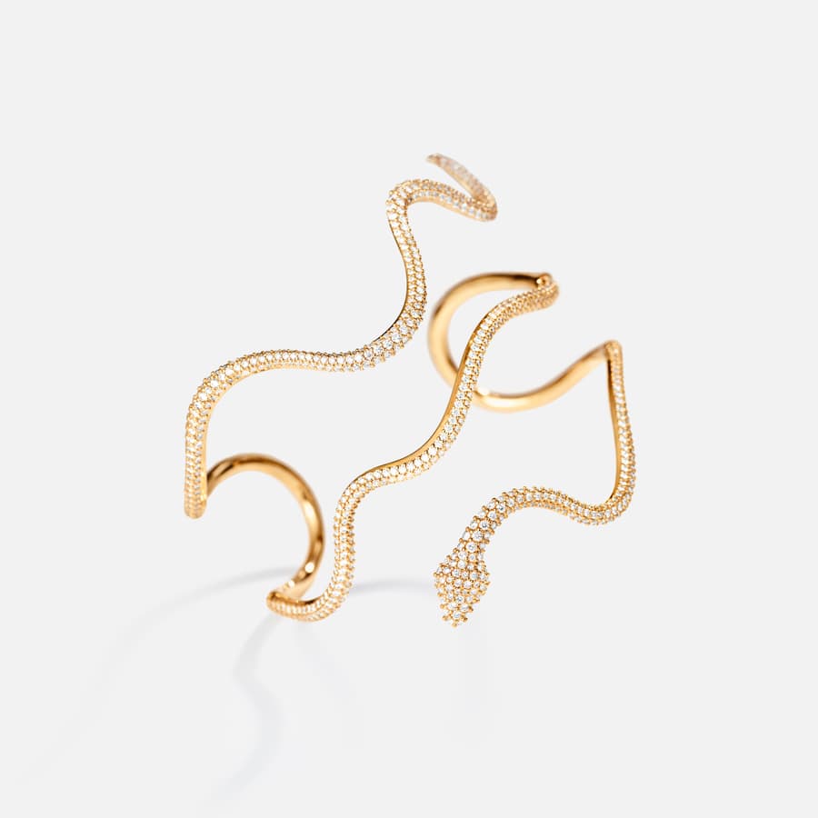 Snakes bangle pave in 18 karat yellow gold with pavé-set diamonds  |  Ole Lynggaard